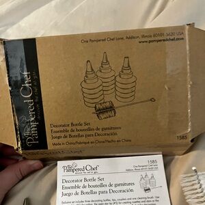 Pampered chef decorator bottle set new-box is open but product had not been used
